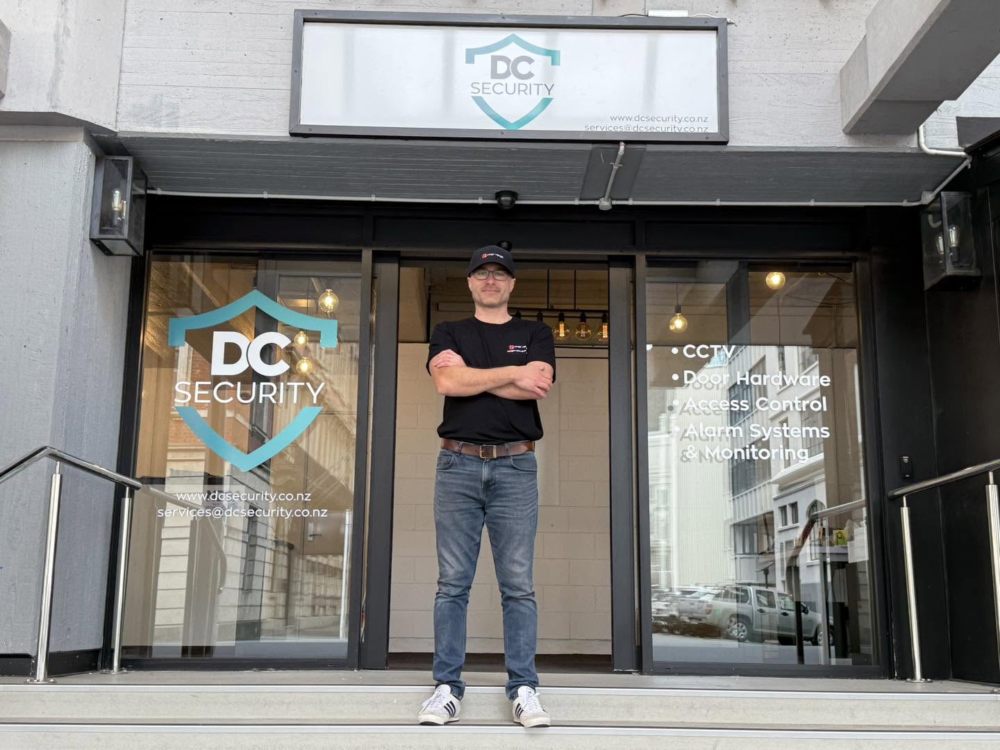 DC Security technician outside the Wellington storefront